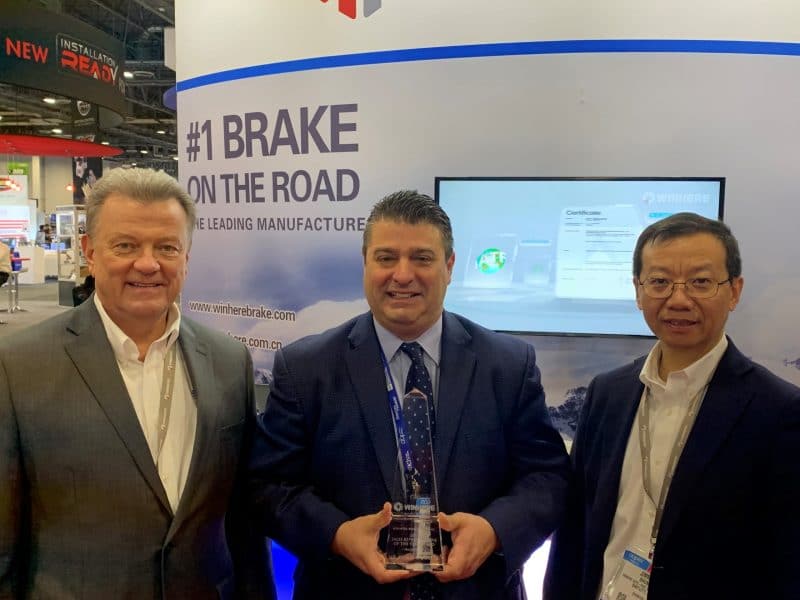 Doug Labac, VP Sales & Marketing, Winhere Brake Parts (left) and Jimmy Shum, President, Winhere Brake Parts (right) present Chick Capoli Jr, Chick Capoli Sales Company, with Winhere’s first representative of the year award.