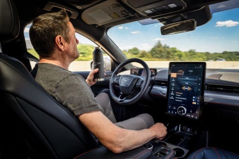 John Gilchrist, Ford Mustang Mach-E engineer, demonstrates Active Drive Assist, a new driver-assist feature that allows for hands-free driving on more than 100,000 miles of divided highways in all 50 states and Canada
