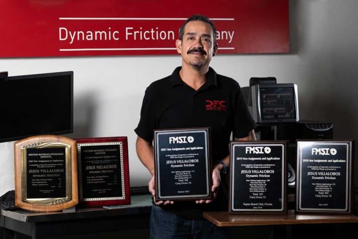 Jesus "Chuy" Villalobos, DFC R & D Manager, holds the 2021 FMSI award for New Assignments and Applications