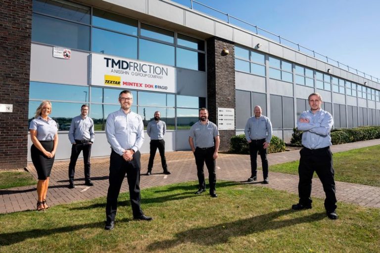 TMD Friction U.K. management staff outside the U.K. facility which added a second paint line in 2021