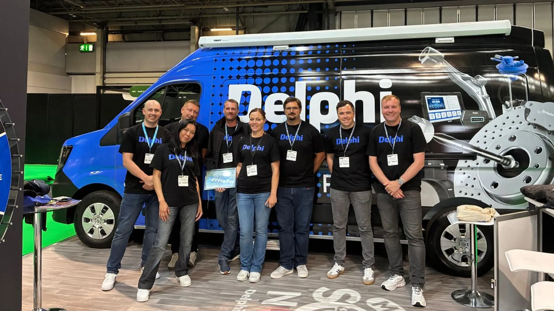 Delphi team with the Best Stand Award at the UK Garage & Bodyshop Event.