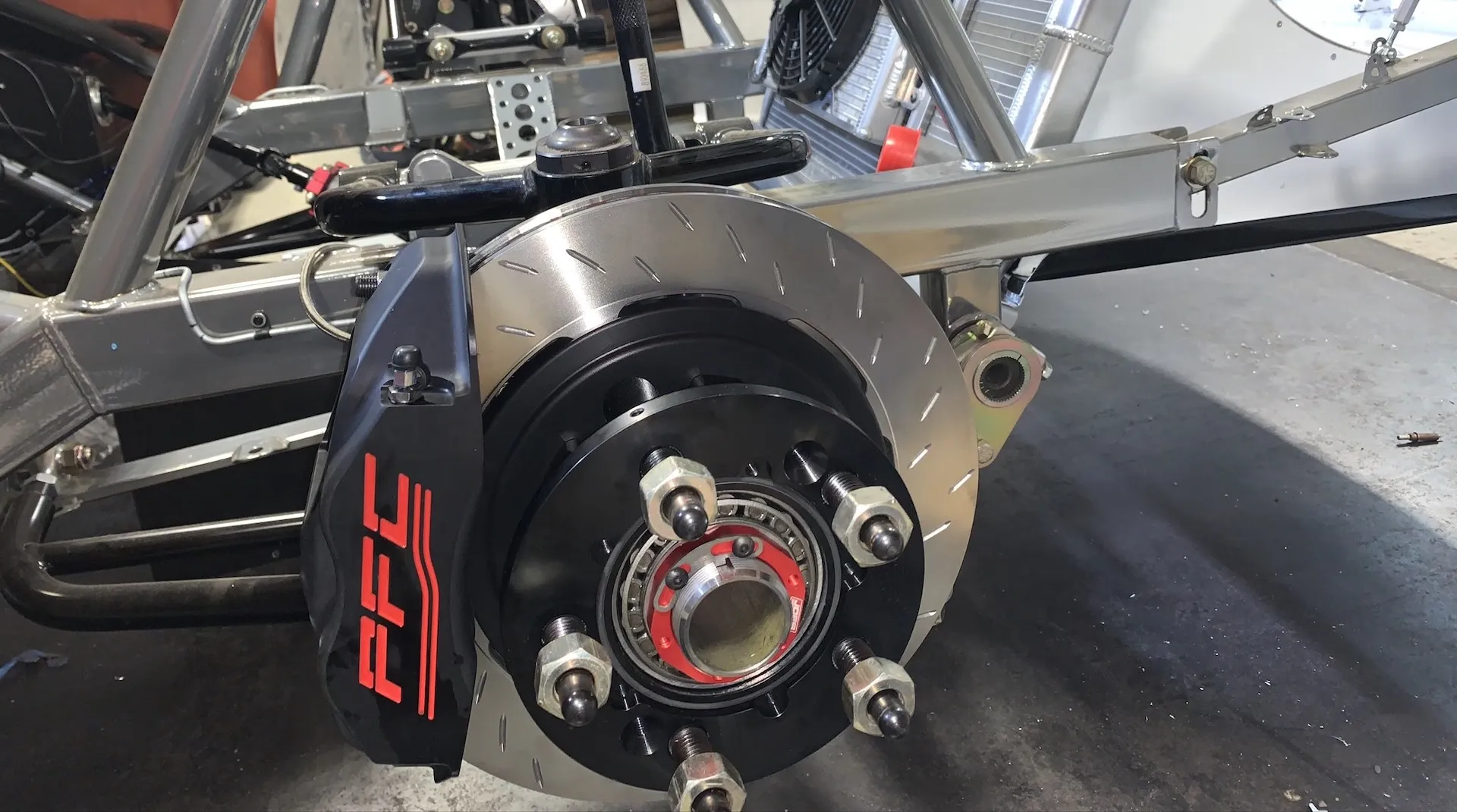 PFC Brakes caliper and pad kit installed on a short track race car