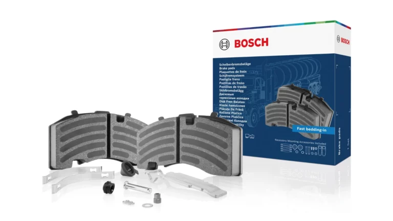 Bosch commercial vehicle brake pads with coated friction surface and included installation accessories for trucks, trailers, and buses