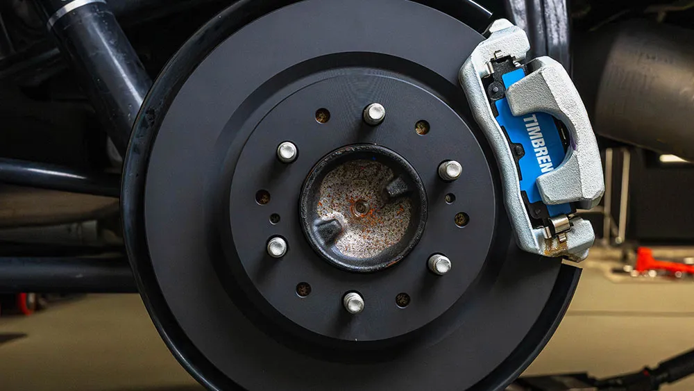Timbren BES severe-duty coated brake rotor and low-metallic brake pad installed on a Ford F-350 towing a camper