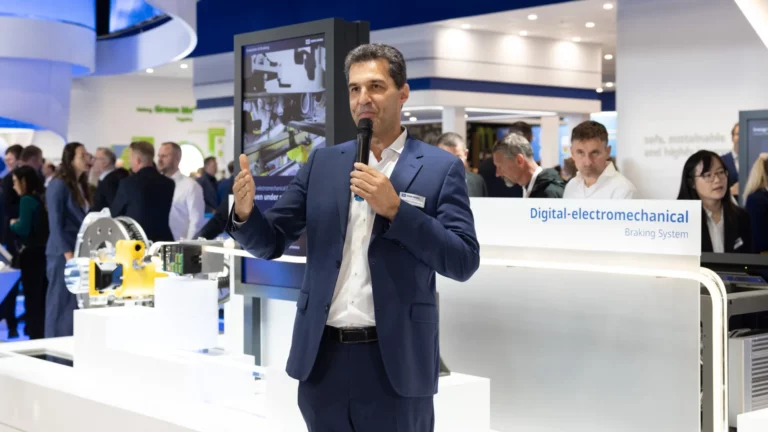Knorr-Bremse and Trenitalia representatives present the rail brake-by-wire EM brake at InnoTrans