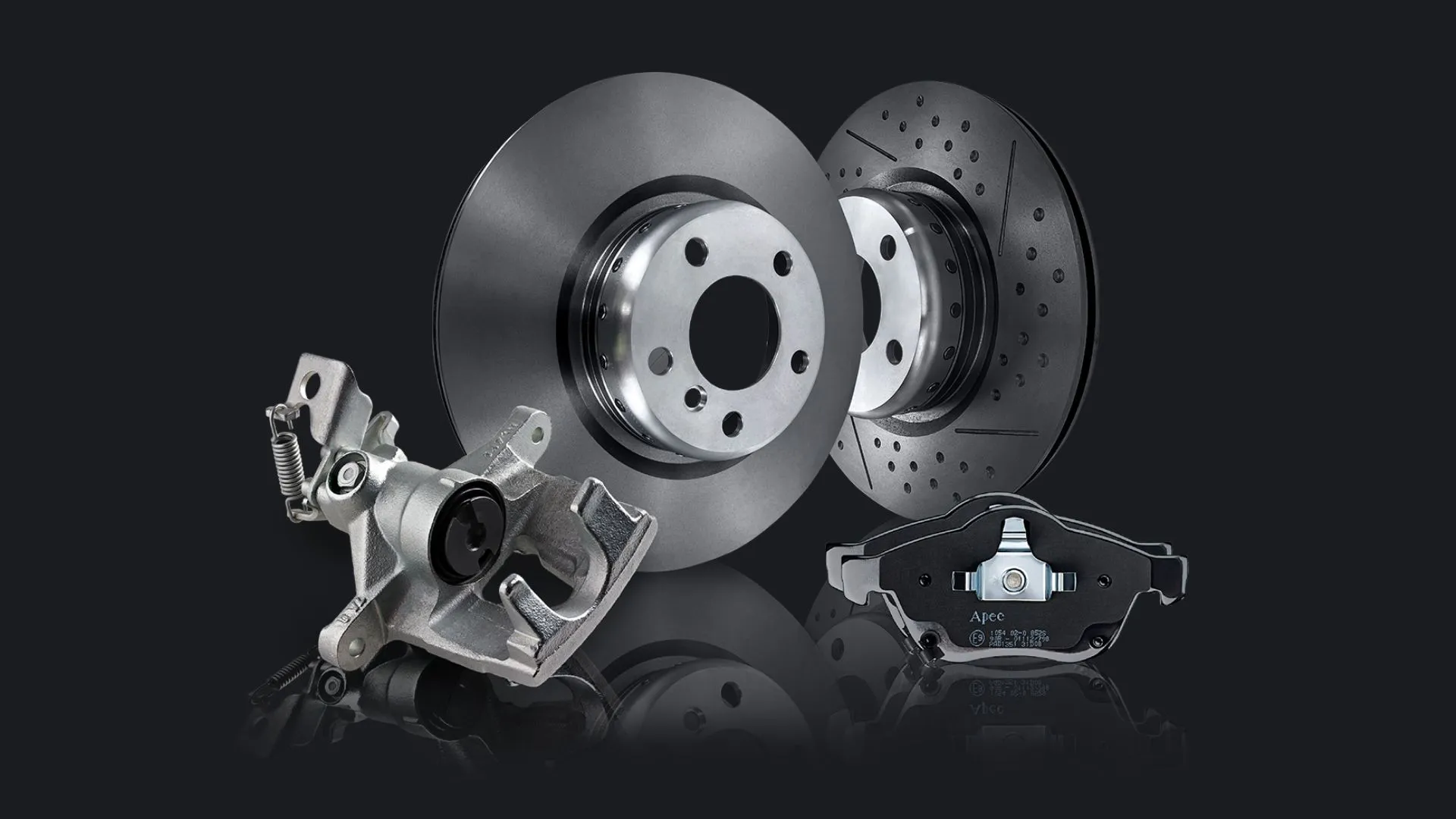Apec braking range components, including a brake caliper, plain and drilled-and-slotted brake discs, and an Apec brake pad set