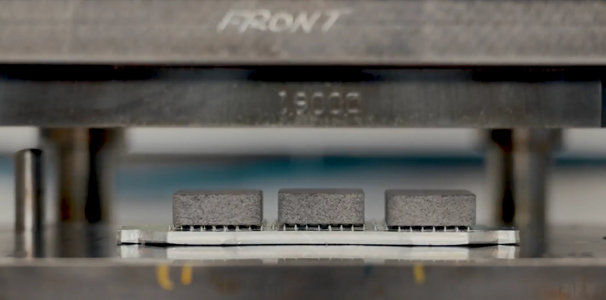 Video thumbnail of NUCAP's NRS Fusion brake pad technology, showing a friction puck pressed onto a galvanized backing plate