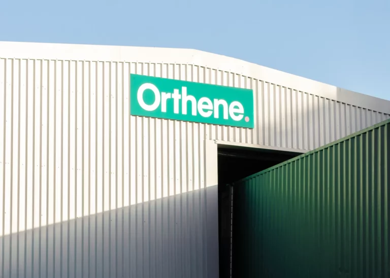 Orthene sign on a corrugated metal building, the UK brake fluid maker partnering on brake fluid production in Thailand